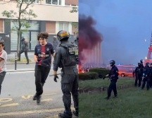 La Prefectura de Policía cifró en 20.000 los aficionados que se reunieron en los Campos Elíseos de París para seguir la final entre el PSG y el Arsenal. ESPECIAL.