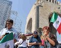 Aspectos del ambiente en el Monumento a la Revolución. Asistentes esperan la llegada de la Presidenta Claudia Sheinbaum. SUN/S. Cadena