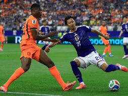Con goles de gran factura y emociones hasta el final, Japón reaccionó dos veces para firmar un espectacular 2-2 ante Países Bajos. AFP.