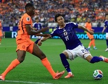Con goles de gran factura y emociones hasta el final, Japón reaccionó dos veces para firmar un espectacular 2-2 ante Países Bajos. AFP.