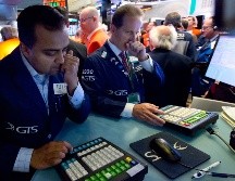 La Bolsa de Nueva York retrocedió después de que la Fed anunciara que no modifica los tipos de interés. AP/ARCHIVO