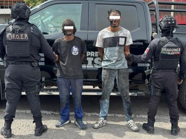 Los elementos de seguridad estatales localizaron a dos hombres que intentaron robar un banco en El Salto, quienes intentaron escapar por la azotea. ESPECIAL