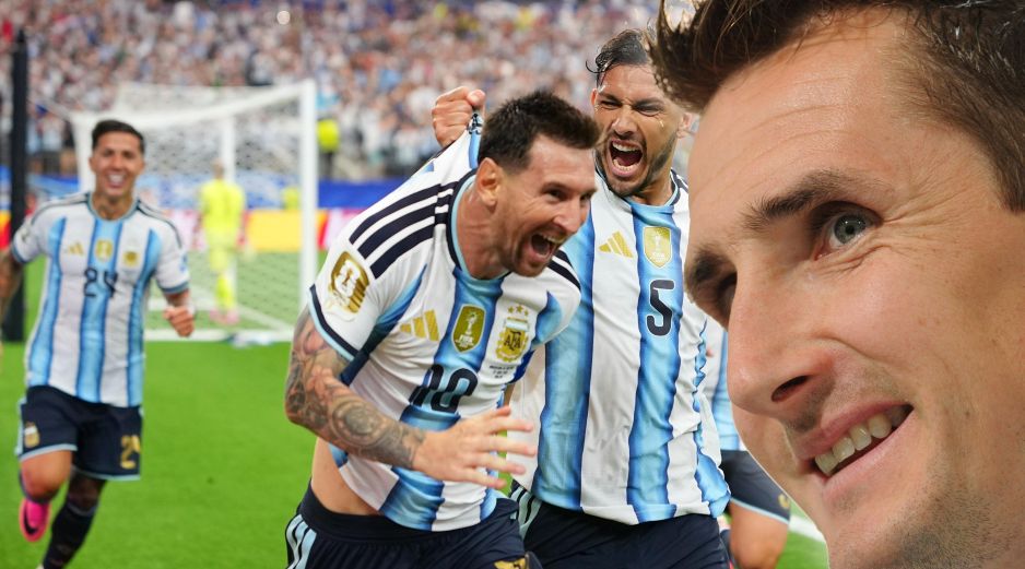 Klose felicita a Messi tras haber roto su récord. AP /Julio Cortez