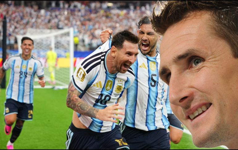 Klose felicita a Messi tras haber roto su récord. AP /Julio Cortez