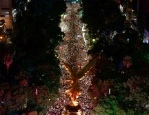 800 mil aficionados se reunieron en el Ángel de la Independencia para festejar a la Selección Mexicana. EFE/ T. PÉREZ