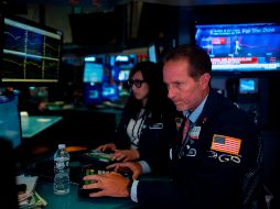 En el acumulado semanal, el Dow Jones fue el único indicador con una ligera ganancia del 0.6%. AFP/ARCHIVO