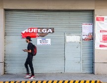 La vigilancia de las sucursales continúa, aunque el desgaste económico ha obligado a los trabajadores a modificar su dinámica cotidiana. EL INFORMADOR/A. Navarro