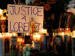 Velas encendidas durante una vigila en honor de Lorenzo Salgado Araujo, un mexicano abatido a tiros el día anterior por un agente de inmigración, el miércoles 8 de julio de 2026, en Houston. AP/M. Felix