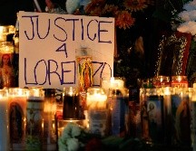 Velas encendidas durante una vigila en honor de Lorenzo Salgado Araujo, un mexicano abatido a tiros el día anterior por un agente de inmigración, el miércoles 8 de julio de 2026, en Houston. AP/M. Felix