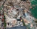 Vista aerea tomada con un dron el 17 de julio de 2026 del sitio de un derrumbe de una montaña provocado por las lluvias a lo largo de una sección del río Wujiang, en la municipalidad de Chongqing, en el suroeste de China. Xinhua/H. Wei