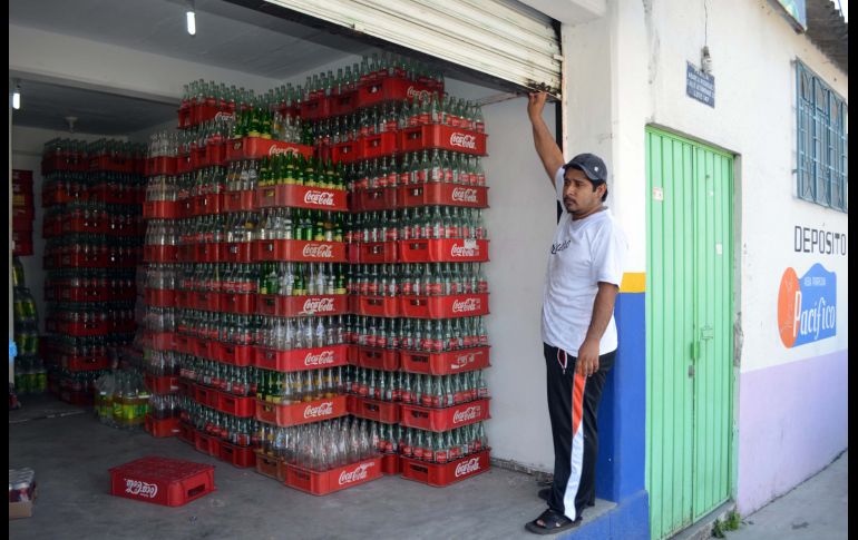 El aumento, señalan, se debe al encarecimiento de insumos para la producción de las bebidas. AP/ARCHIVO