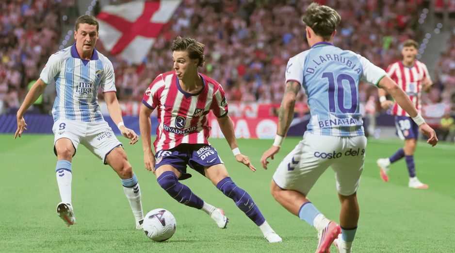 Los Colchoneros aseguraron los primeros tres puntos de la campaña con la victoria ante el Málaga. EFE