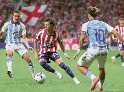 Los Colchoneros aseguraron los primeros tres puntos de la campaña con la victoria ante el Málaga. EFE