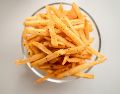 Los belgas afirman que las papas fritas nacieron en el valle del río Mosa a finales del siglo XVII, mientras los franceses sostienen que se inventaron en las inmediaciones del Pont Neuf en París durante la Revolución Francesa. Unsplash