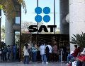El SAT atribuye esta trayectoria sostenida al esfuerzo compartido de la población pagadora de impuestos en las 32 entidades federativas. EL INFORMADOR / ARCHIVO