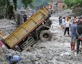 De las 546 personas que continúan sin localizar tras la riada, 261 son extranjeras y proceden de 23 países. EFE/YONHAP