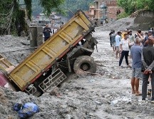 De las 546 personas que continúan sin localizar tras la riada, 261 son extranjeras y proceden de 23 países. EFE/YONHAP