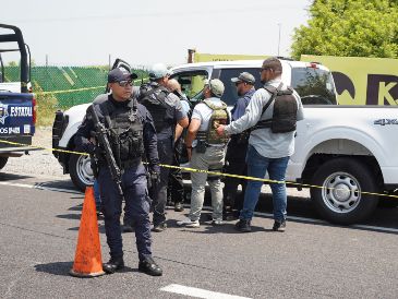 El cuerpo de Zenyazen Escobar fue ubicado en la comunidad de La Gloria con al menos un impacto de arma de fuego. AFP/V. Razo