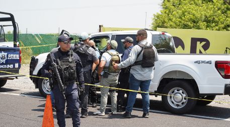 El cuerpo de Zenyazen Escobar fue ubicado en la comunidad de La Gloria con al menos un impacto de arma de fuego. AFP/V. Razo