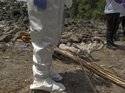 En el sitio, ubicado en la comunidad de La Curva, también se detectó una fosa en la que hay cuerpos de reciente inhumación. AFP/ARCHIVO