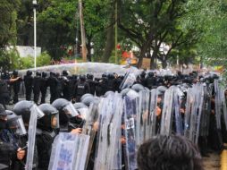 La CEDHJ abrió un acta de investigación y dictó medidas cautelares tras las detenciones registradas durante la protesta de este domingo. EL INFORMADOR/J. ACOSTA.