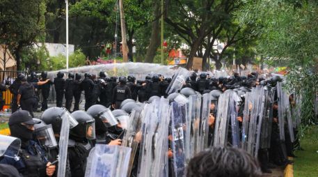 La CEDHJ abrió un acta de investigación y dictó medidas cautelares tras las detenciones registradas durante la protesta de este domingo. EL INFORMADOR/J. ACOSTA.