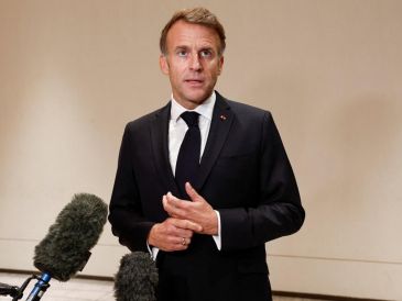 El presidente francés indicó que "en momentos como este se ve quien quiere a Francia y quien no". EFE/EPA/B. Tessier