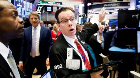 Este viernes estuvo marcado por las pérdidas; sin embargo, en el acumulado semanal el Dow Jones reportó un avance ligero. EFE/ARCHIVO