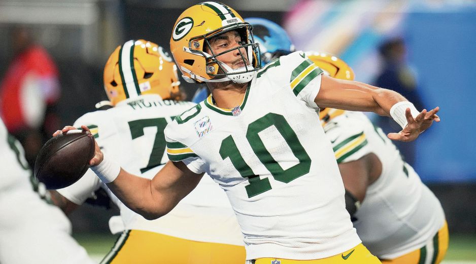 Jordan Love. El quarterback lanzó tres pases de anotación y acumuló 288 yardas para conducir la victoria de Green Bay. AP