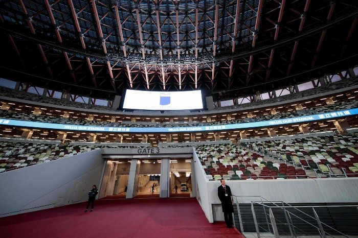 The National Stadium, venue for the upcoming Tokyo 2020 Olympic Games, is seen during a media tour following the stadium's completion in Tokyo on December 15, 2019. The Tokyo 2020 Olympics organisers on December 15 celebrated the completion of the main stadium that features use of lumber and other Japanese architectural tradition, seven months before the Opening Ceremony. / AFP / Behrouz MEHRI OLY-2020-TOKYO-JPN-STADIUM